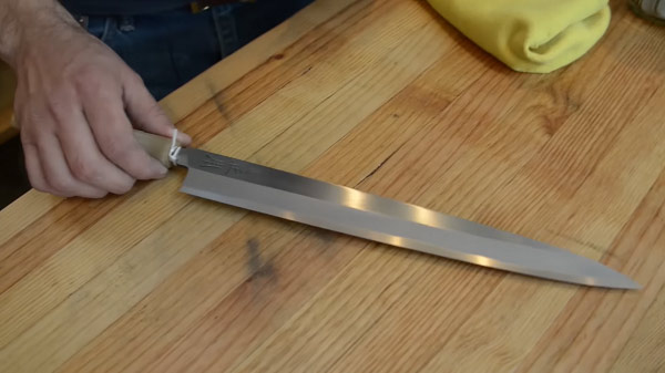 How do you cut with a chef knife ?