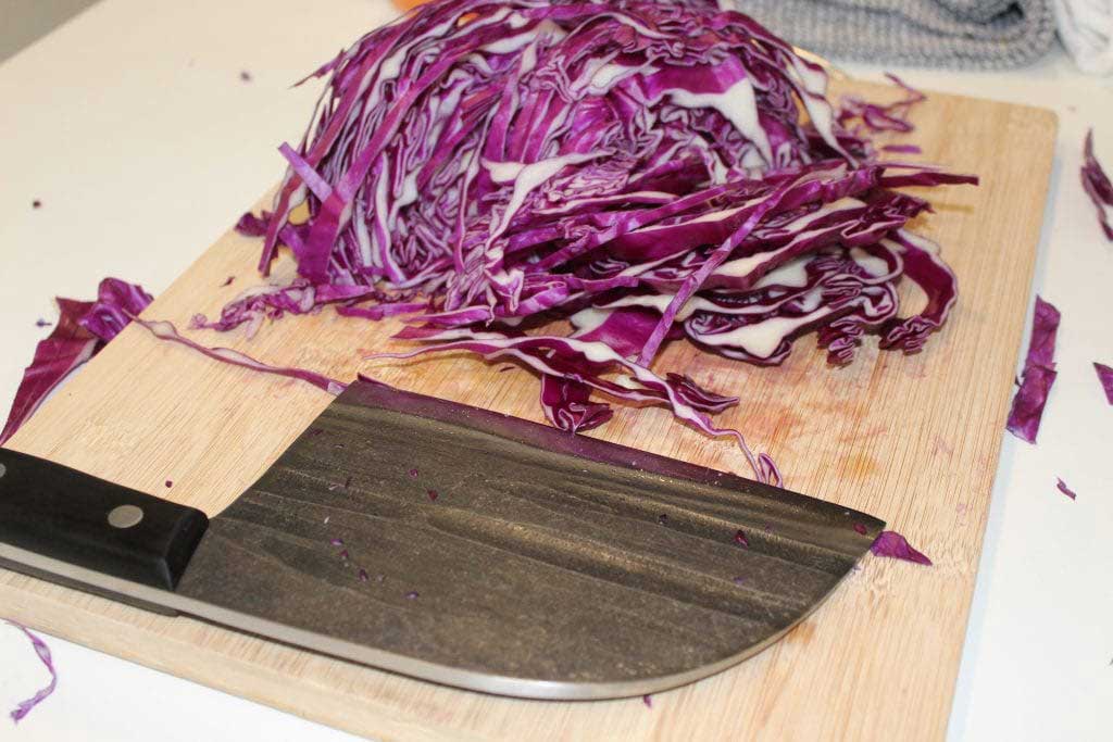 A-Serbian-knife-on-a-cutting-board-and-next-to-it-a-red-cabbage-cut-1024x683