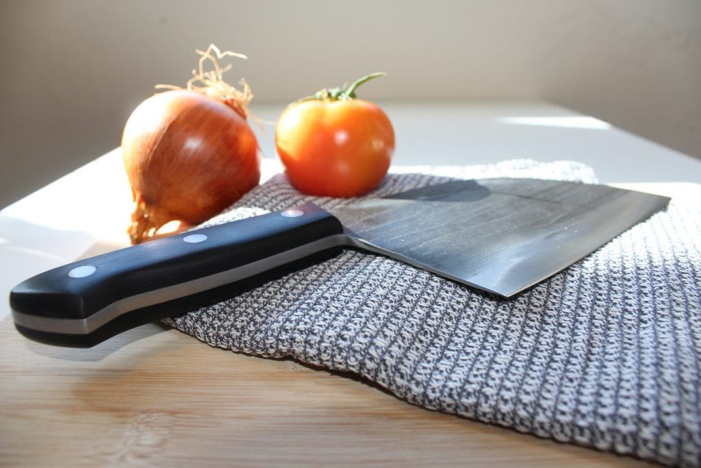 Serbian-Knife-on-a-towel-with-onion-and-tomato-1024x683-1